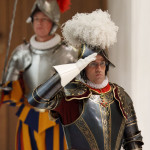 SWISS GUARD COMMANDER SALUTES DURING SWEARING-IN CEREMONY AT VATICAN